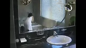 Thai teen gets her tight asshole stretched in the bathroom