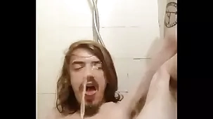 Young woman satisfies her partner by mouth and urine play
