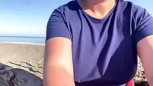 Milf restrained at public beach leads to outdoor peeing and potential drink
