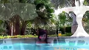 Brunette teen enjoys solo poolside pleasure