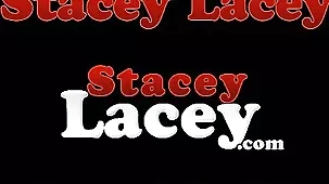 Stacey Lacey, a stunning brunette, showcases her seductive prowess in a solo display
