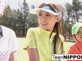 Cute Asian teen girls act out a pranks party golf
